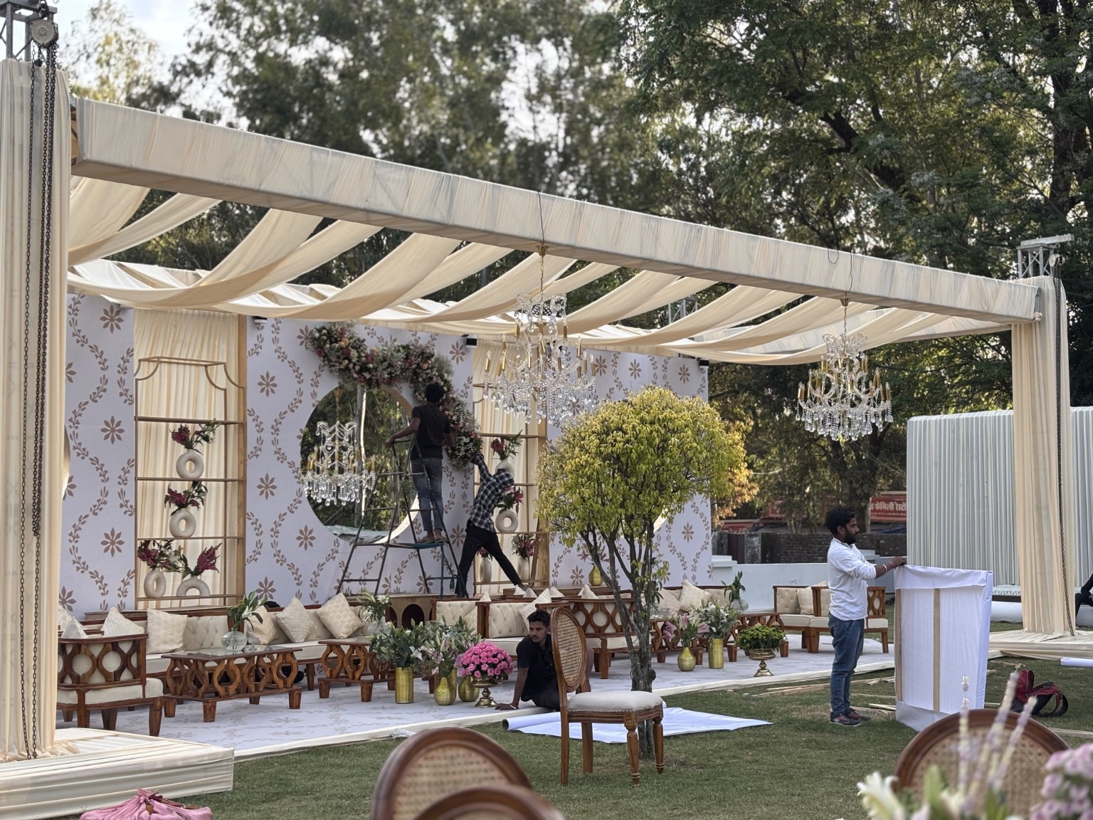 A complete wedding setting with layered draping and floral décor